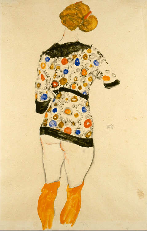 Standing Woman in Patterned Blouse 